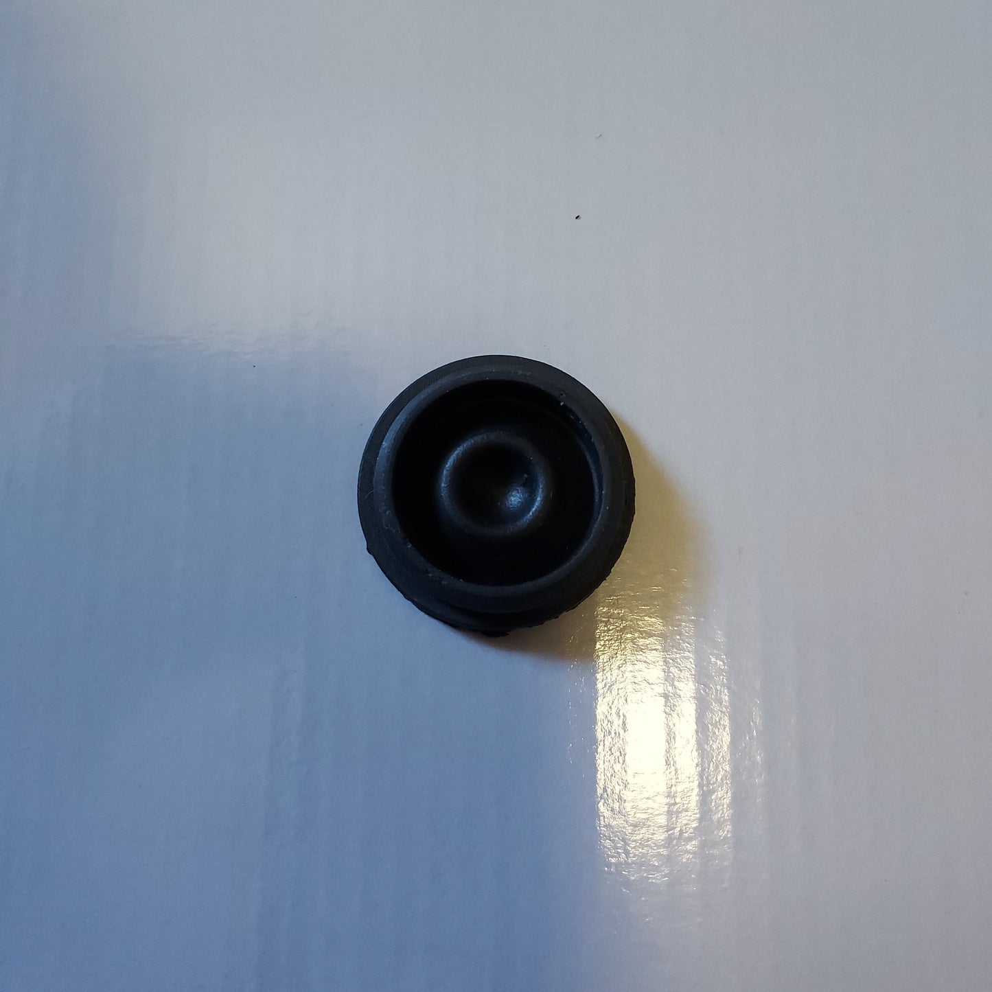 Grease cap plug